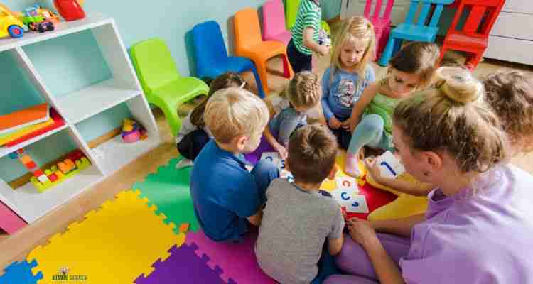 children learning letters together in a group is a benefit of early childhood education