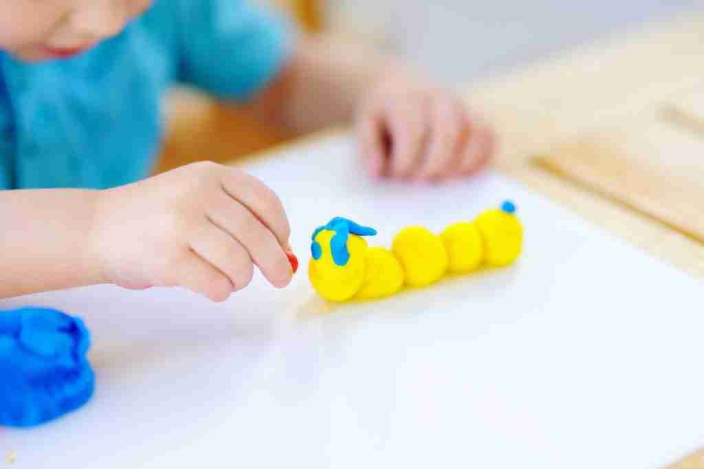 toddler-playing-with-play-doh