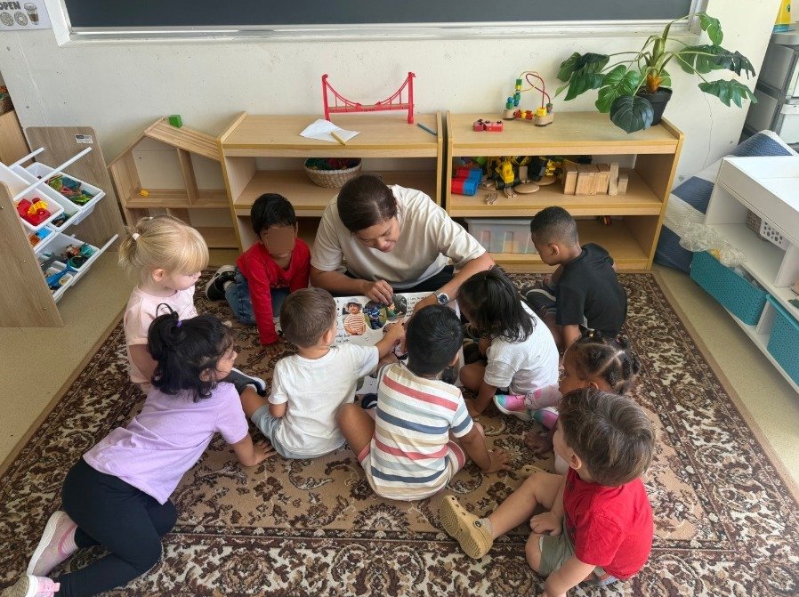 one staff member with eight preschool children
