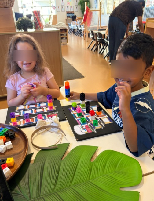 preschool children stacking coloured blocks at kiddie garden preschool parramatta